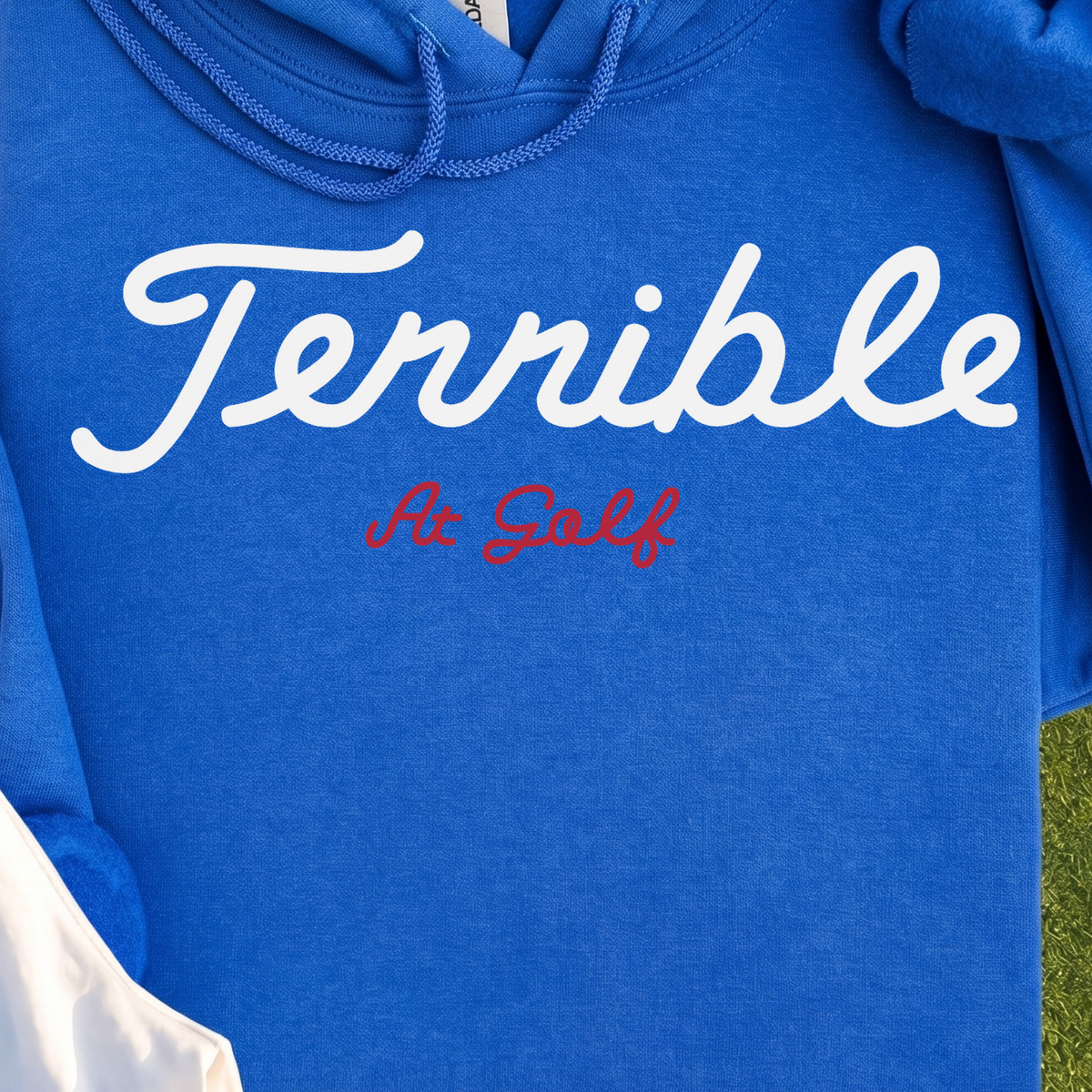Terrible Hoodie, print close-up on Royal