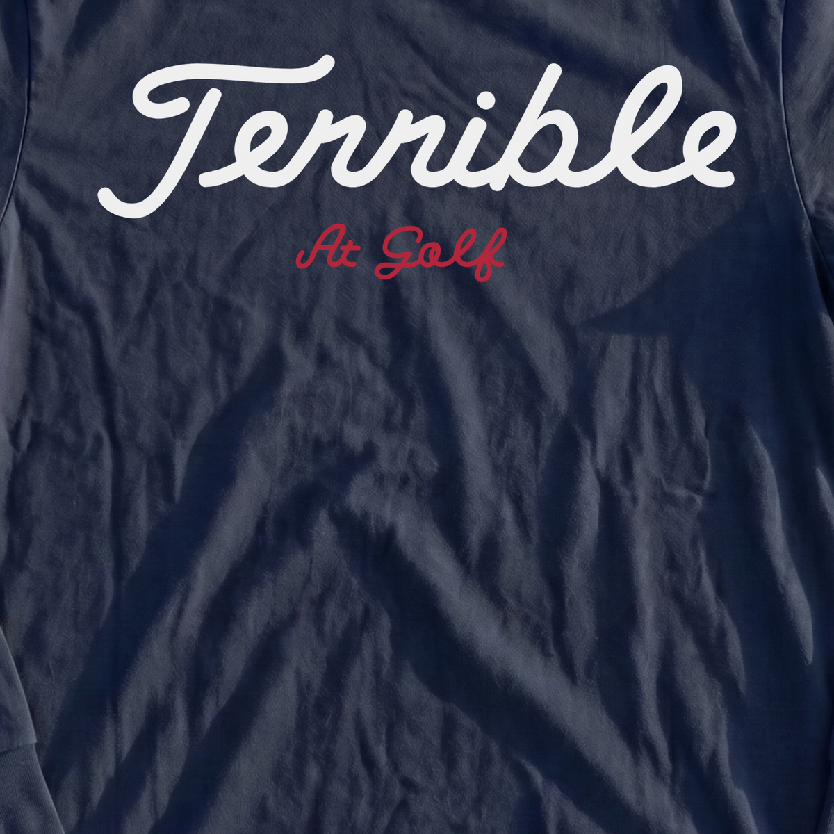 Terrible Long Sleeve Tee, print close-up on Navy