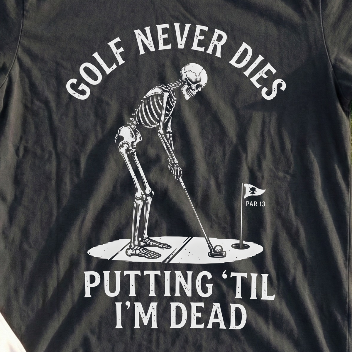 Golf Never Dies Tee, print close-up on Black