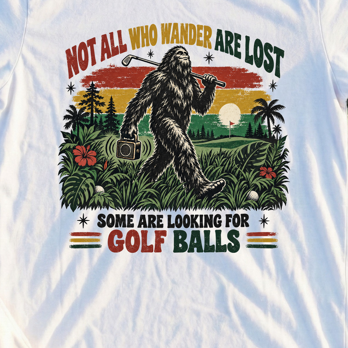 Not All Who Wander Are Lost Bigfoot Tee, print close-up on White