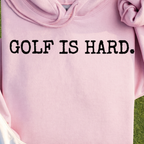 Golf Is Hard Hoodie, print close-up on Light Pink
