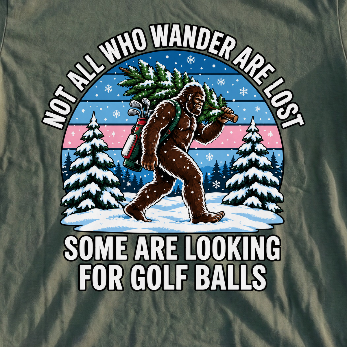 Wandering Sasquatch Christmas Tee, print close-up on Military Green
