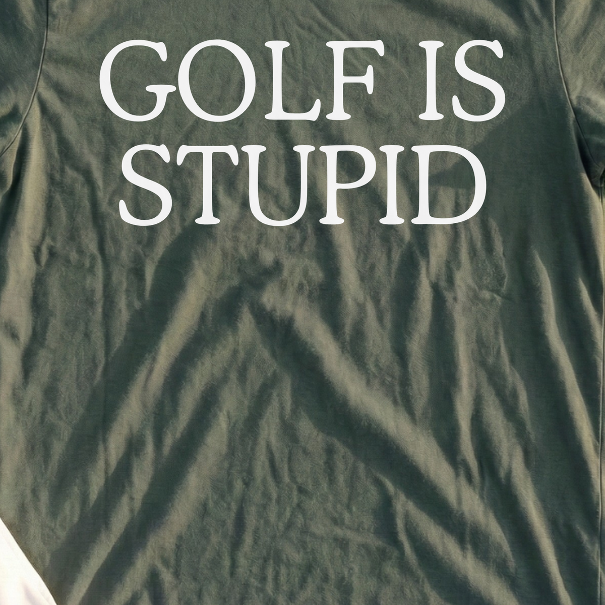 Golf Is Stupid Tee, print close-up on Military Green