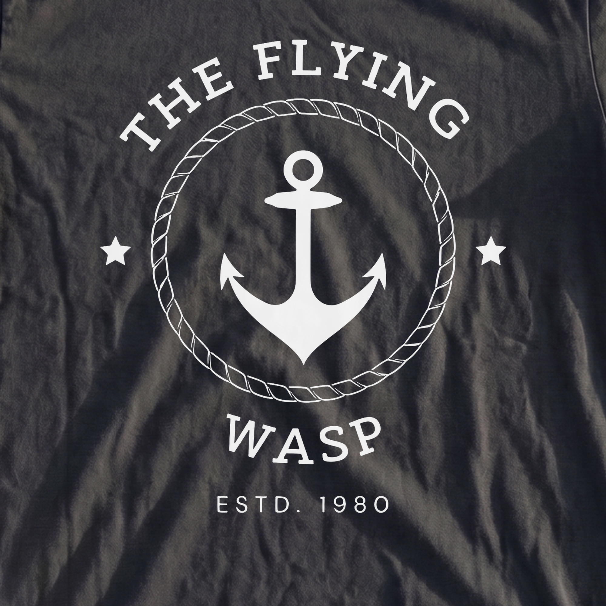 The Flying Wasp Heavyweight Tee, print close-up on True Navy