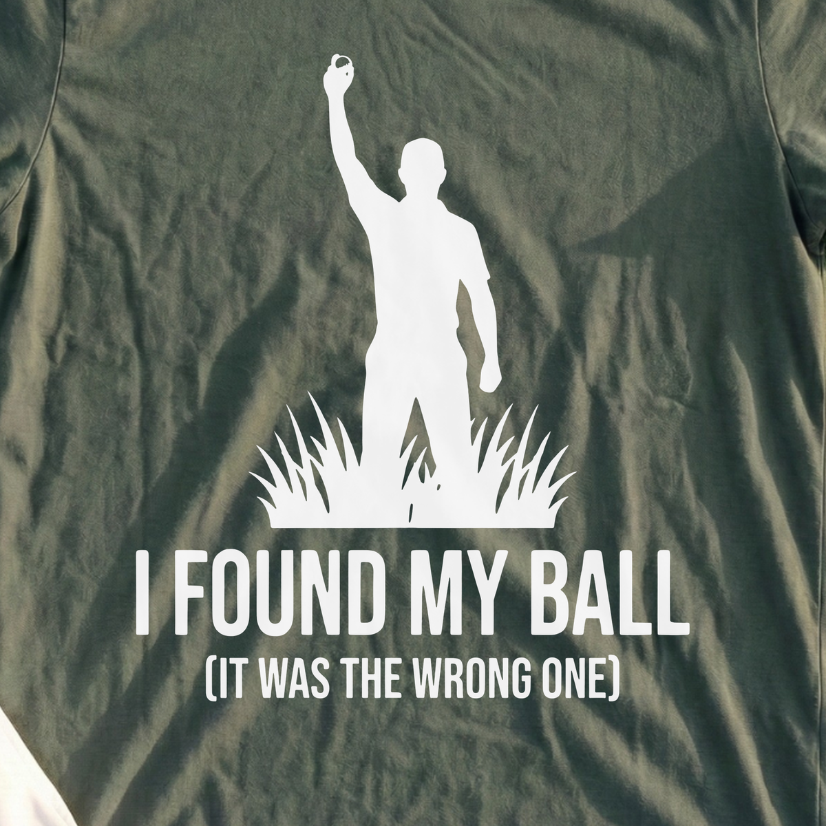 I Found My Ball Tee, print close-up on Military Green