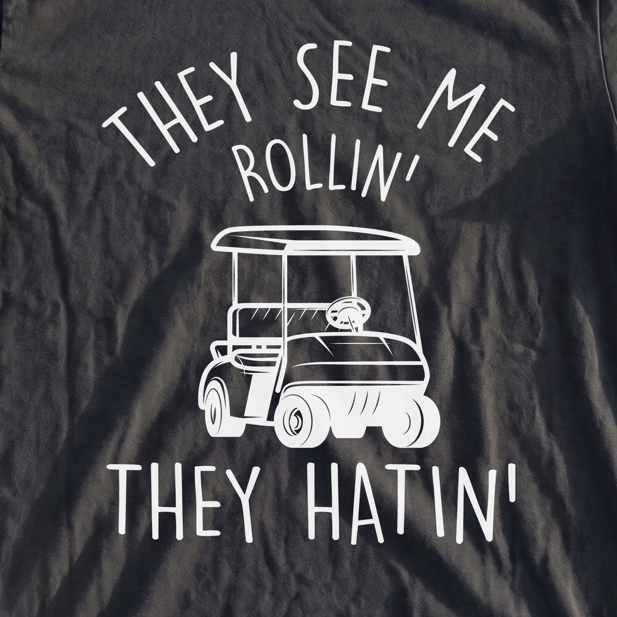 They See Me Rollin Premium Tee, print close-up on Black