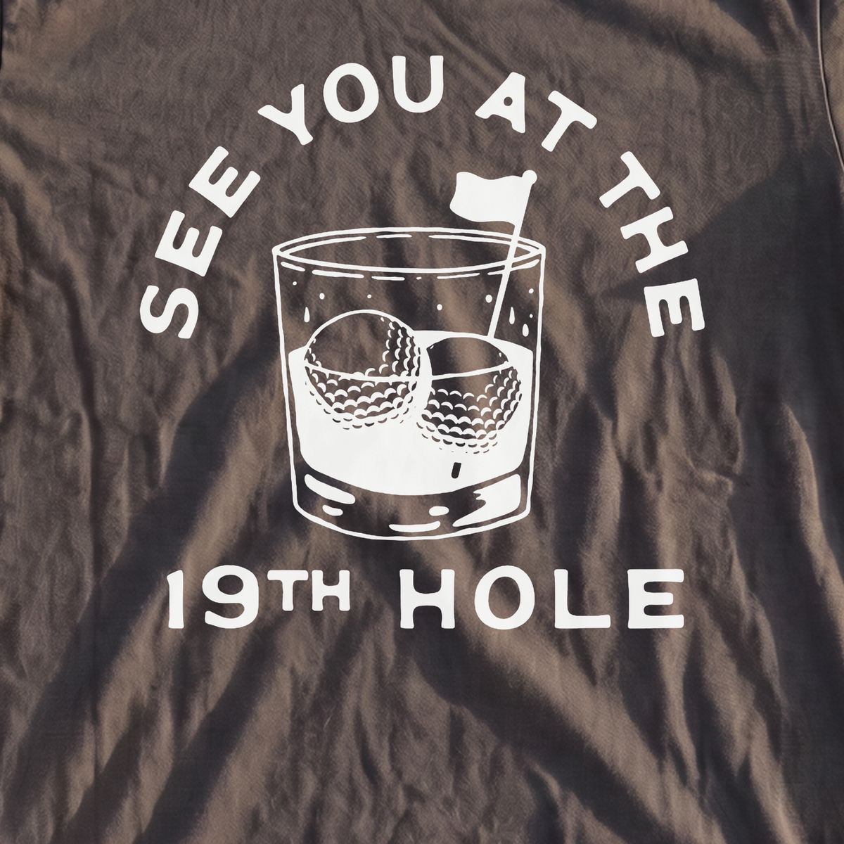 See You At The 19th Hole Premium Tee, print close-up on Pepper