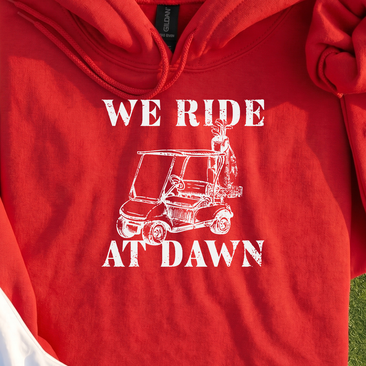 We Ride At Dawn Cart Hoodie, print close-up on Red