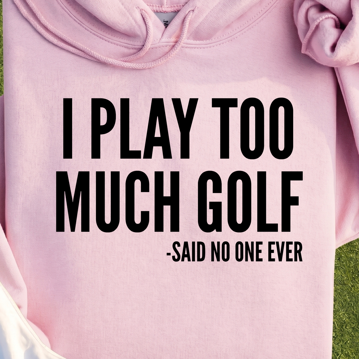 I Play Too Much Golf Hoodie, print close-up on Light Pink
