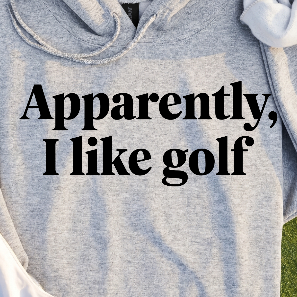 Apparently I Like Golf Hoodie, print close-up on Sport Grey