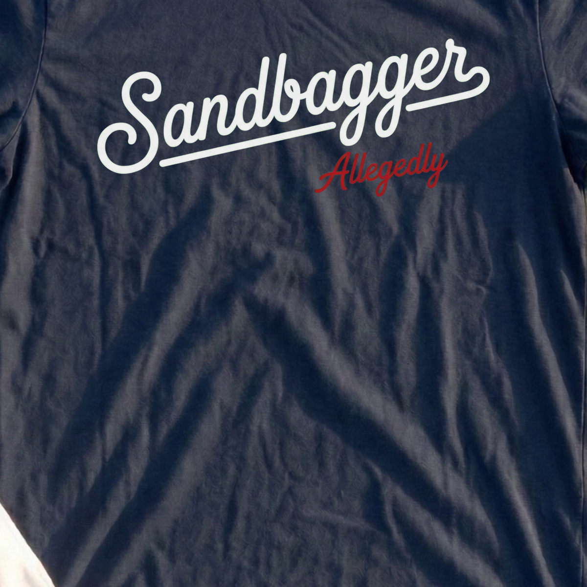 Sandbagger Allegedly Tee, print close-up on Navy