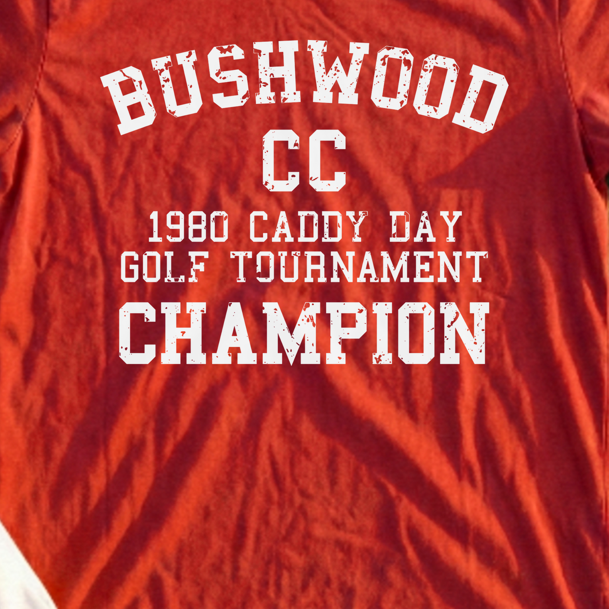 Bushwood Caddy Day Champion Tee, print close-up on Red