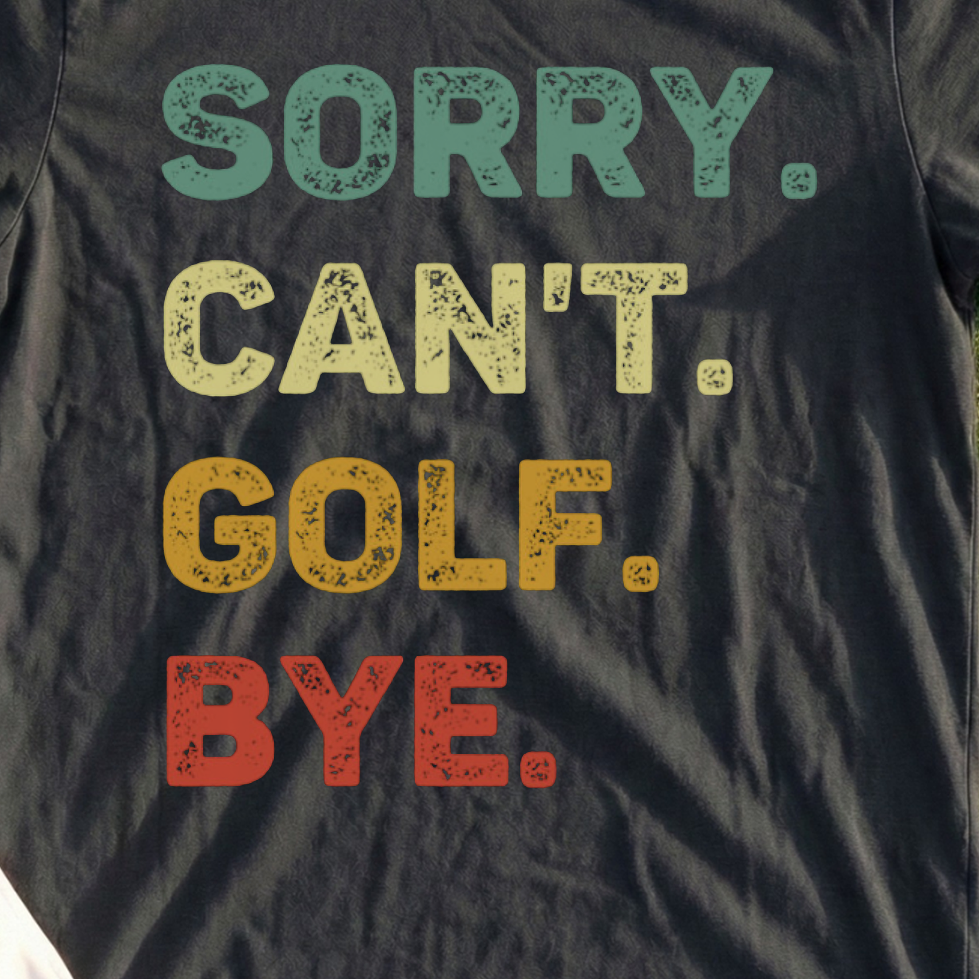 Sorry Can't Tee, print close-up on Black