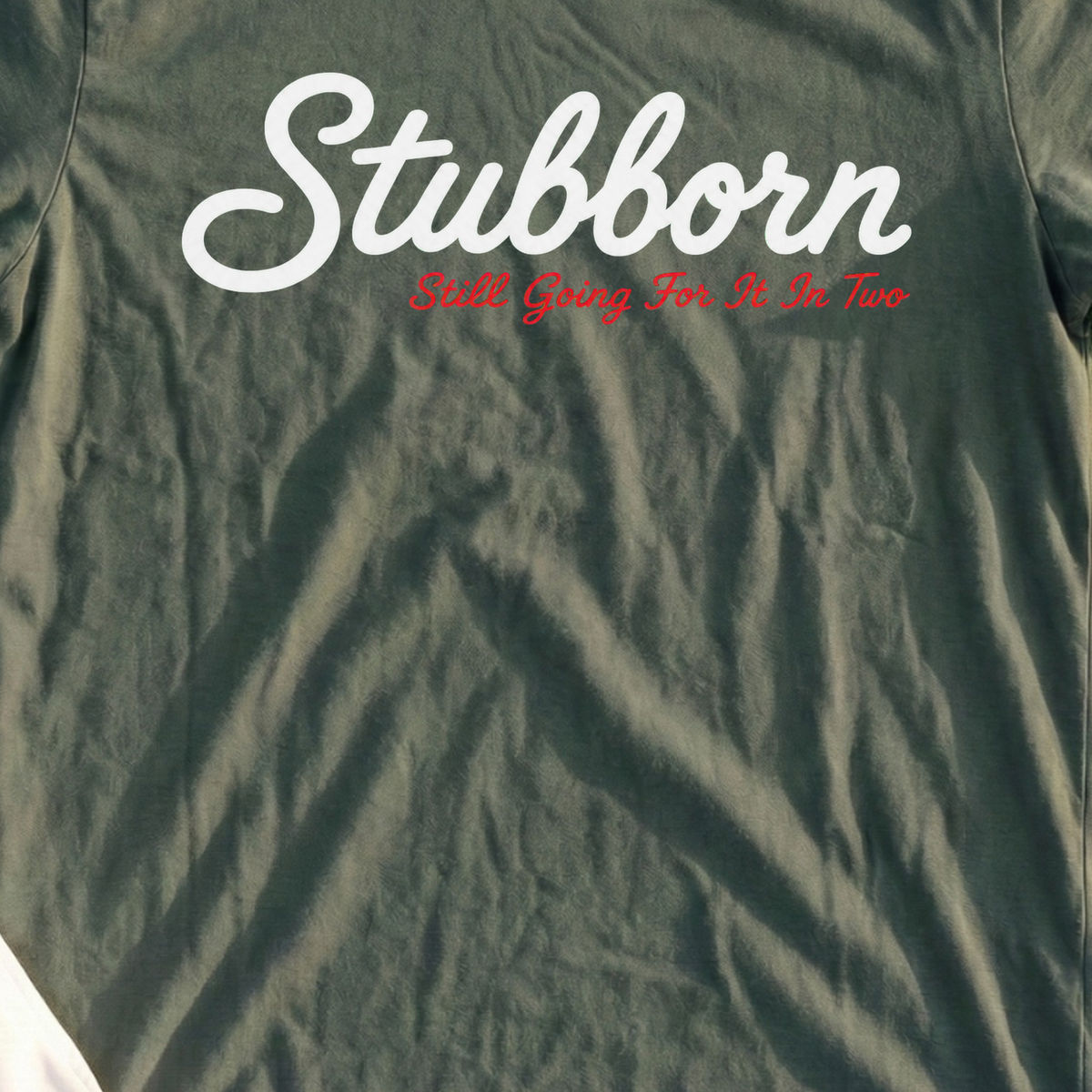 Stubborn Tee, print close-up on Military Green