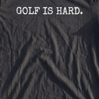 Golf Is Hard Premium Tee, print close-up on Black