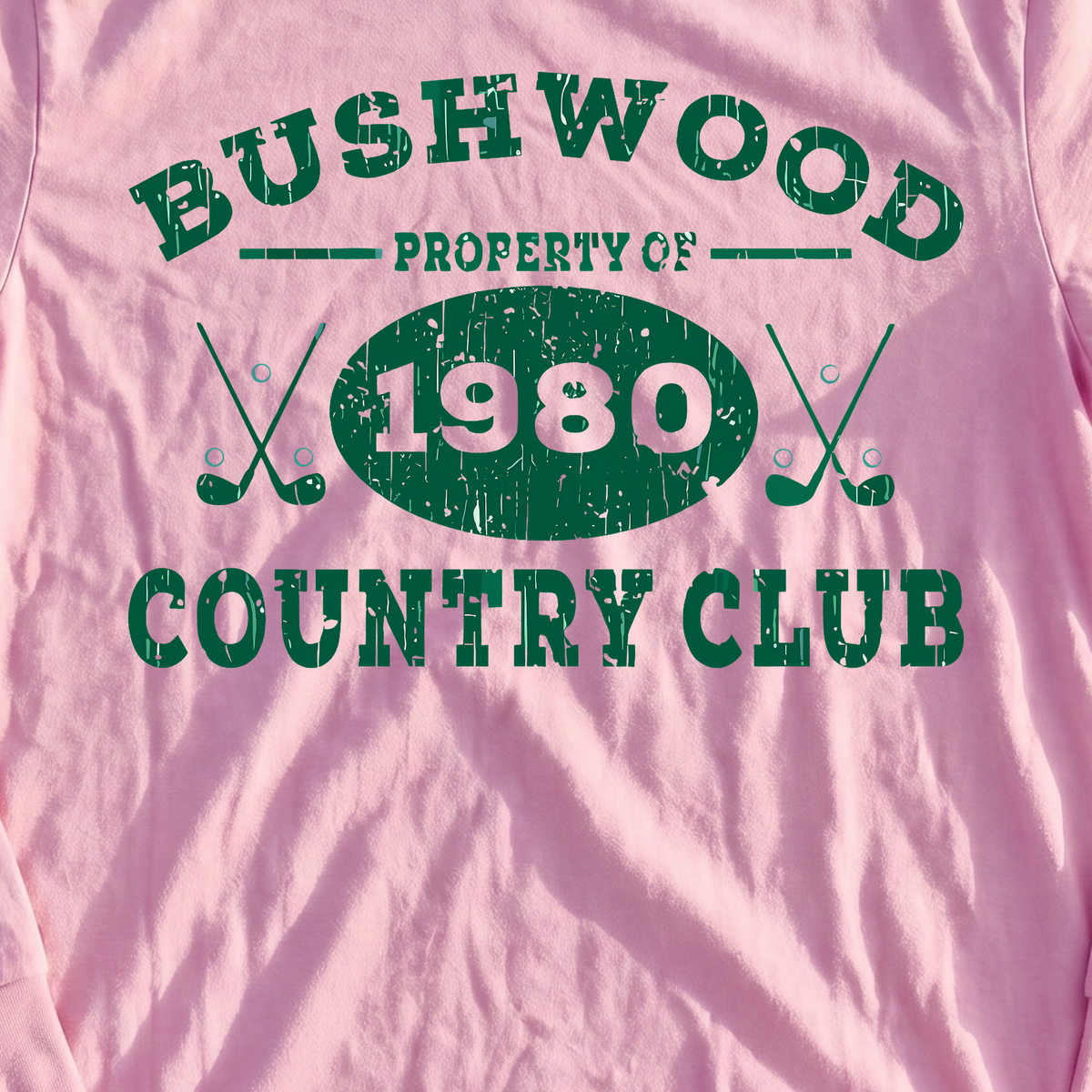 Property Of Bushwood Long Sleeve Tee, print close-up on Light Pink