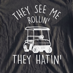 They See Me Rollin Premium Tee, print close-up on Black