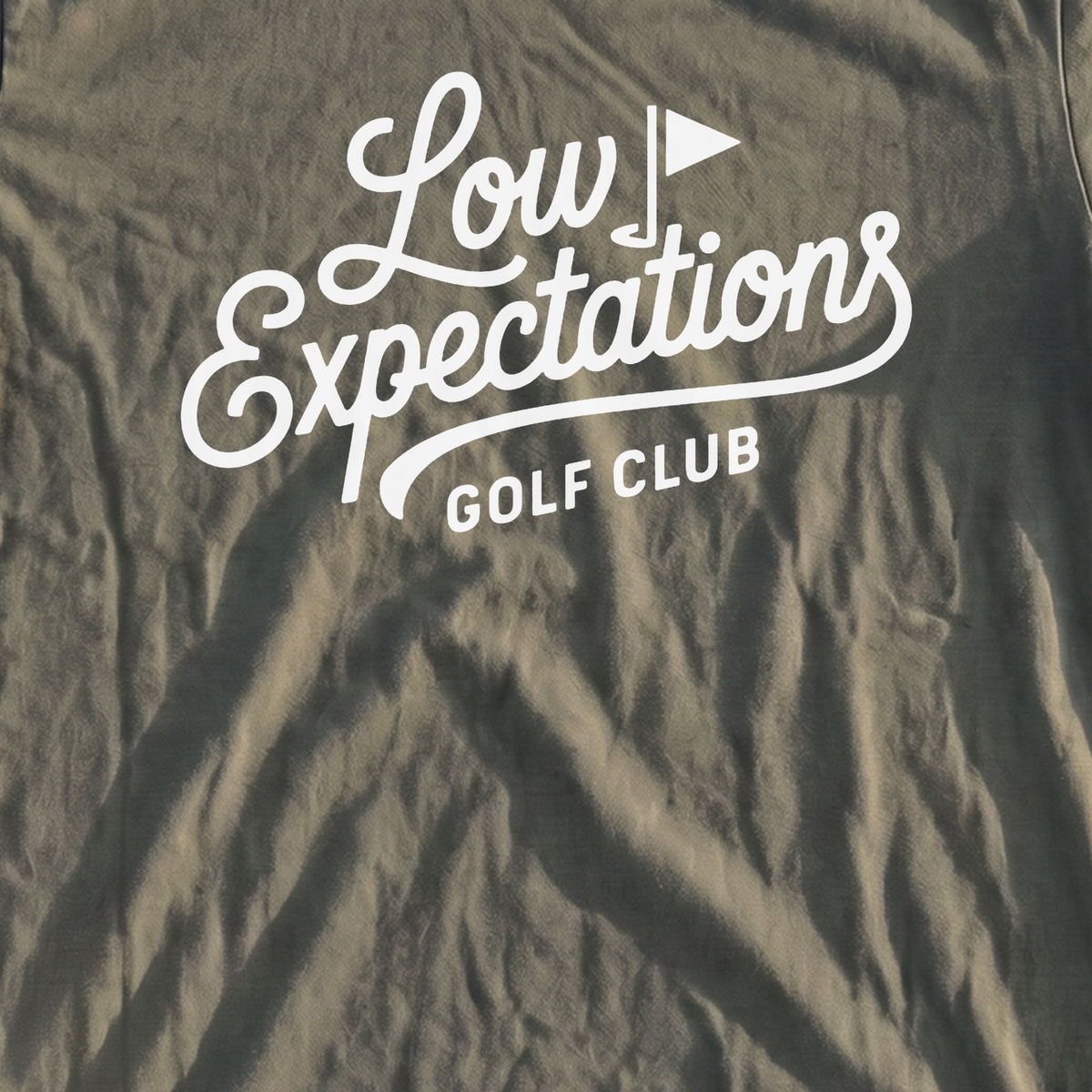 Low Expectations Club Heavyweight Tee, print close-up on Black