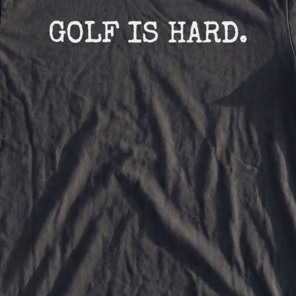 Golf Is Hard Premium Tee, print close-up on Black