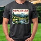 Meet Me At The Creek Travel Poster Tee worn on the golf course, Black