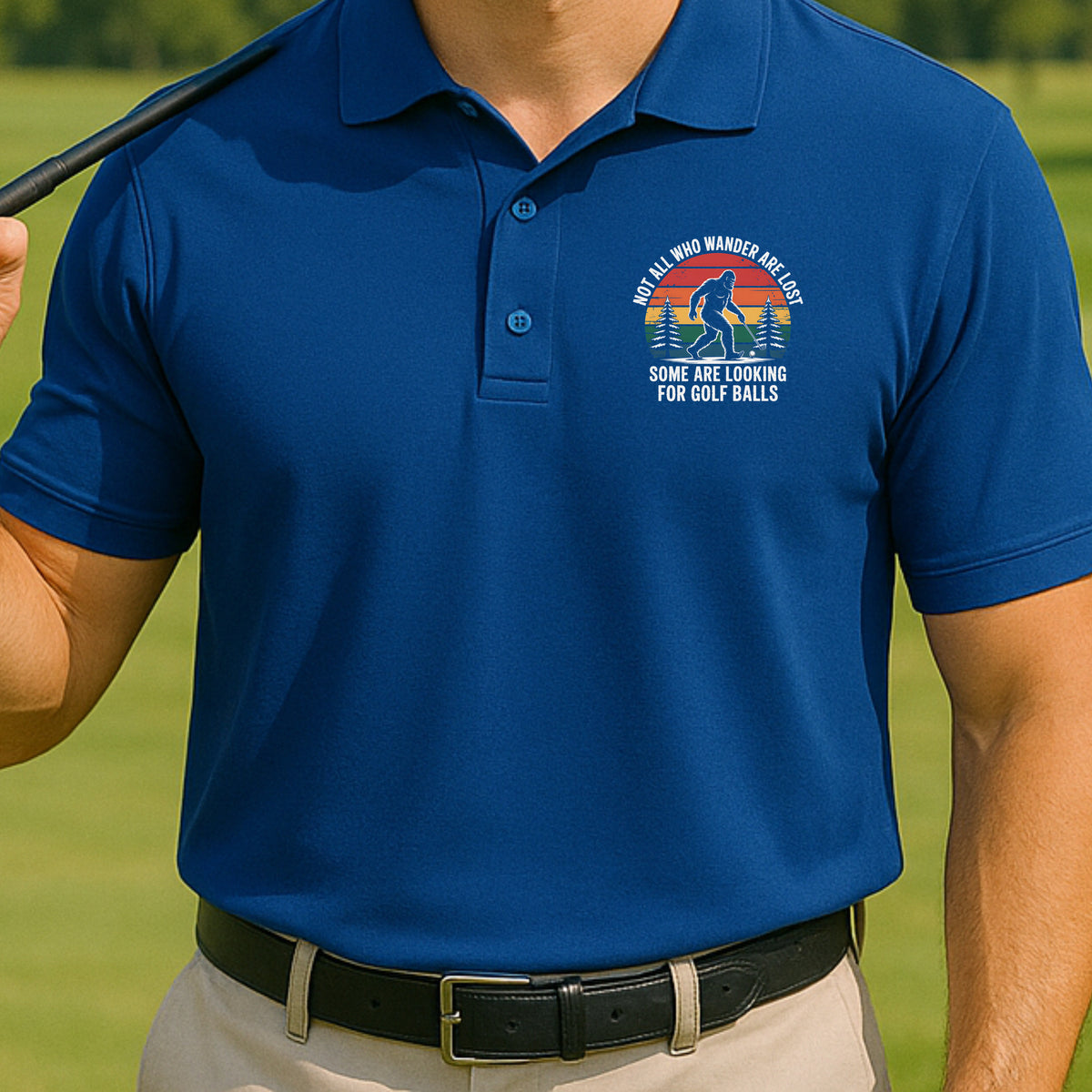 Wandering Sasquatch Performance Polo worn on the golf course, Royal
