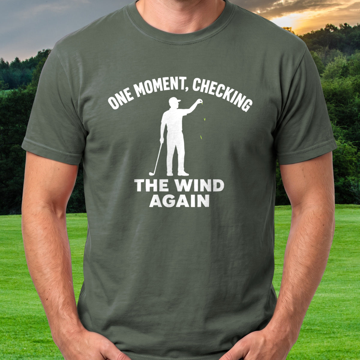 One Moment Checking The Wind Again Tee worn on the golf course, Military Green