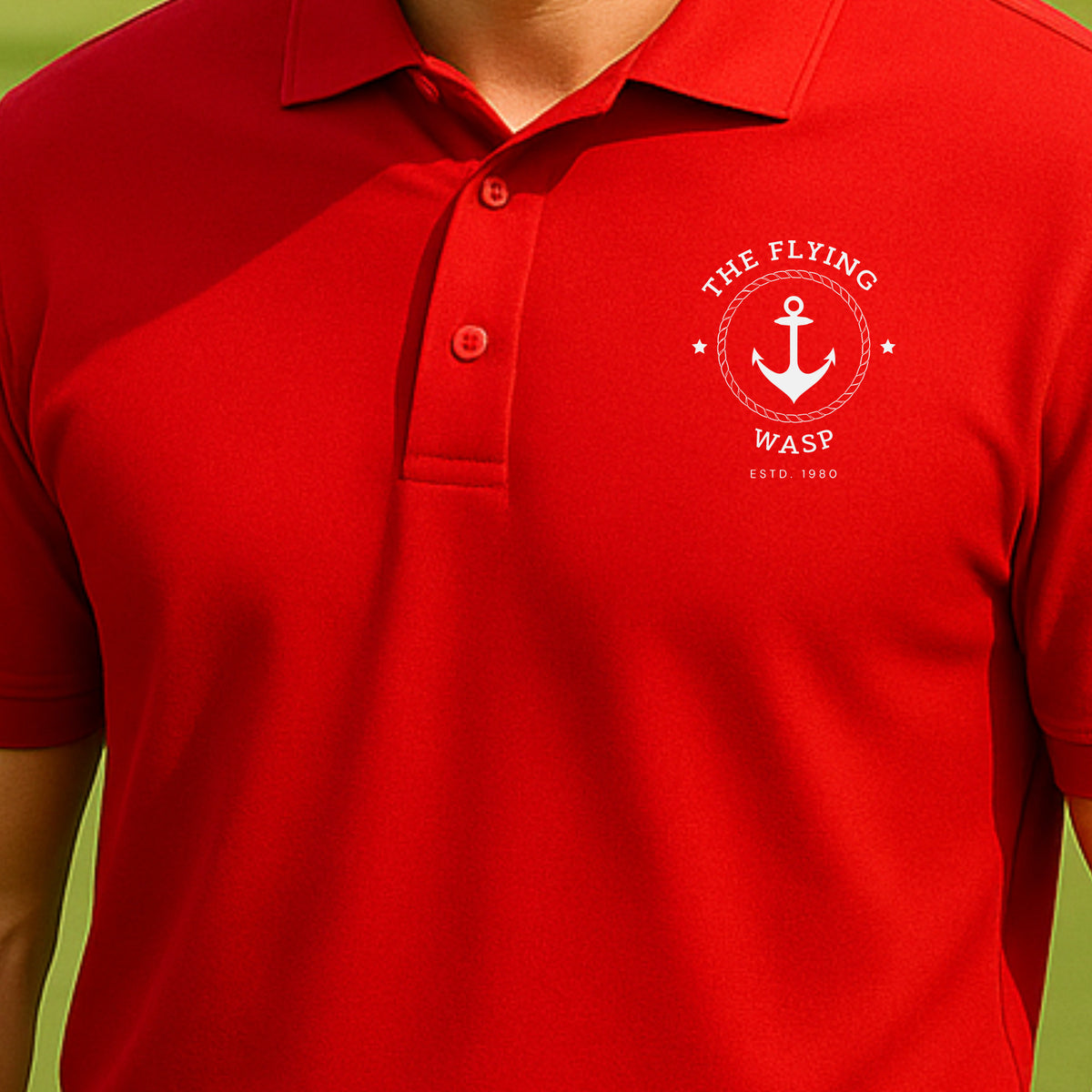 The Flying Wasp Performance Polo worn on the golf course, Red