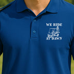 We Ride At Dawn Cart Performance Polo worn on the golf course, Royal
