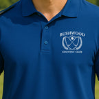 Bushwood Country Club Performance Polo worn on the golf course, Royal