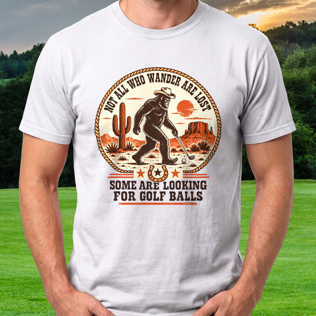 Not All Who Wander Are Lost Rodeo Tee worn on the golf course, White