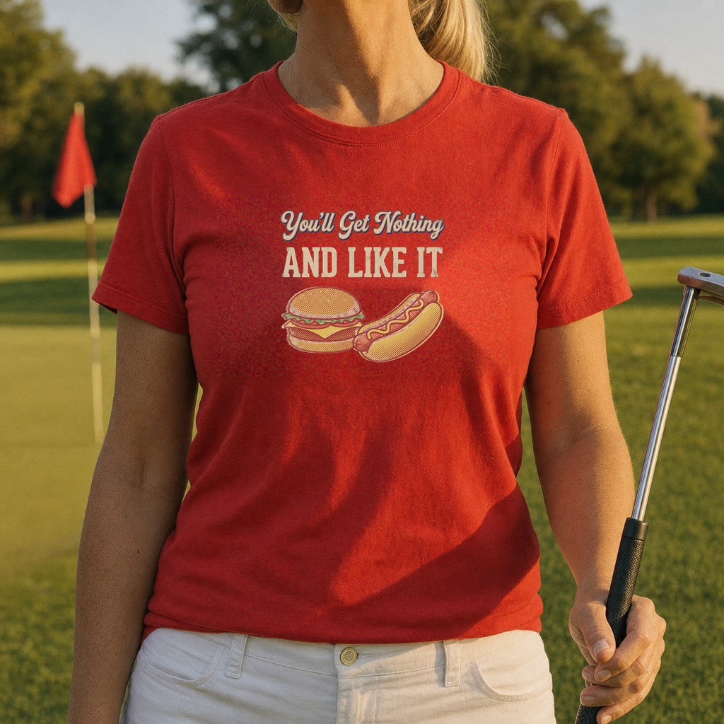 You'll Get Nothing & Like It Tee worn on the golf course, Red