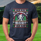 Wandering Sasquatch Ugly Sweater Tee worn on the golf course, Navy