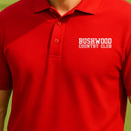 Bushwood Country Club Varsity Performance Polo worn on the golf course, Red