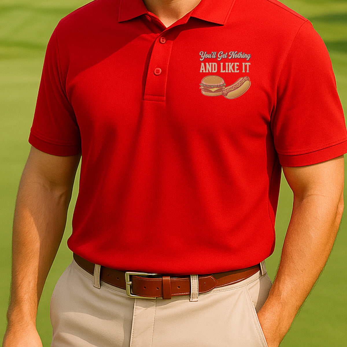You'll Get Nothing & Like It Performance Polo worn on the golf course, Red