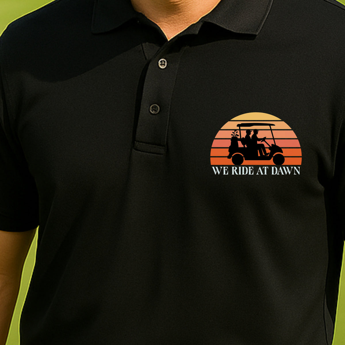 We Ride At Dawn Sunrise Performance Polo worn on the golf course, Black