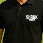 Shank Week Performance Polo worn on the golf course, Black