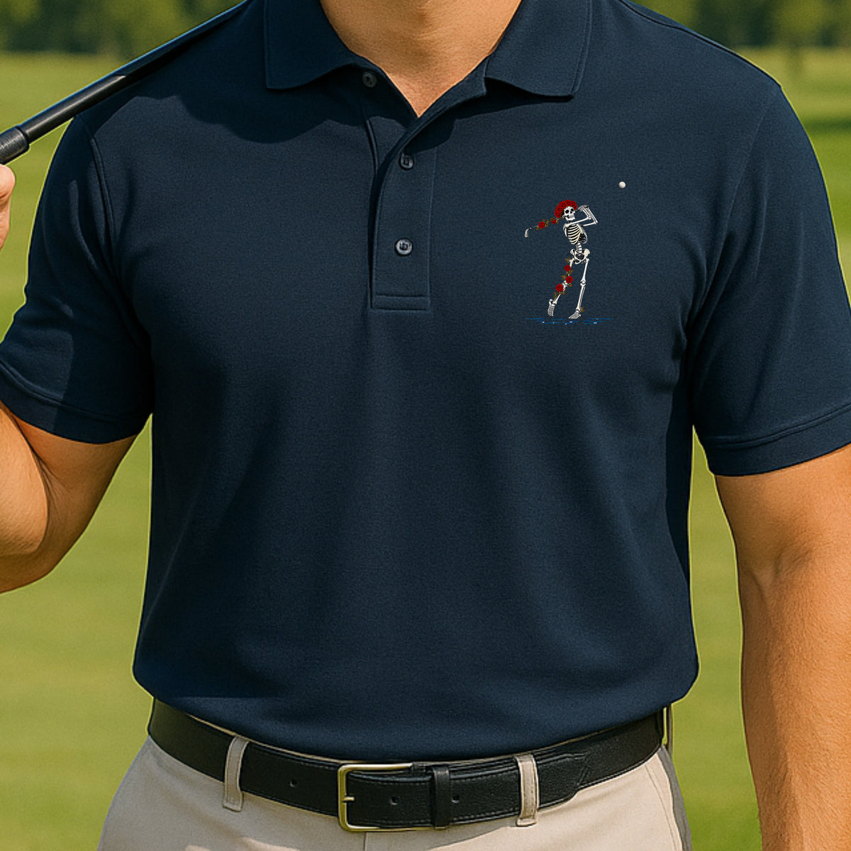 Rose Skeleton Approach Over Water Performance Polo worn on the golf course, Navy
